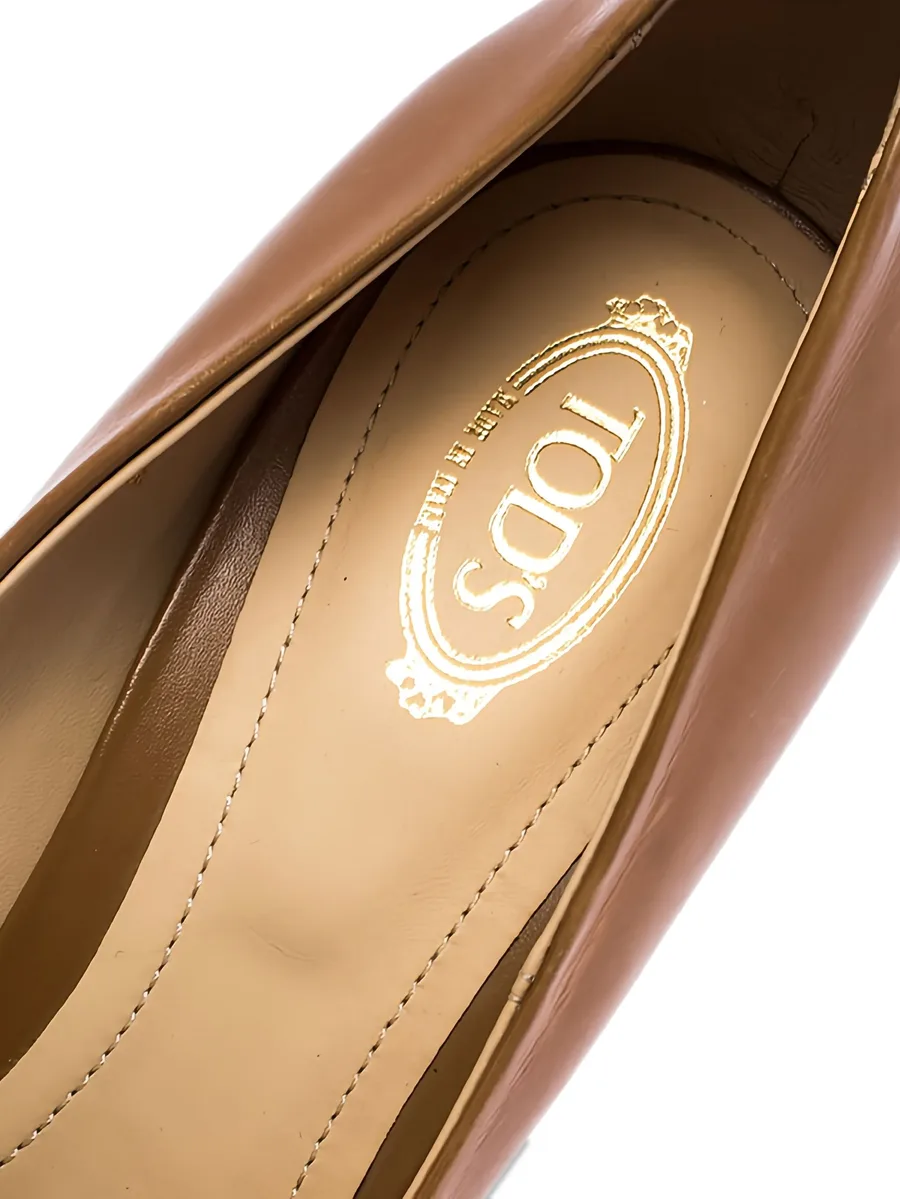 95mm Gommini peep-toe leather pumps 12