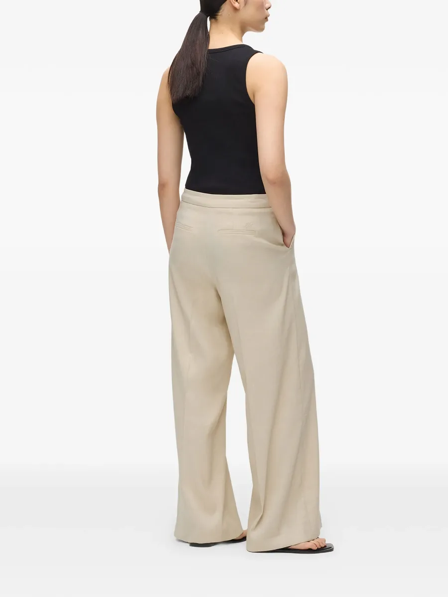 concealed-fastening trousers 7