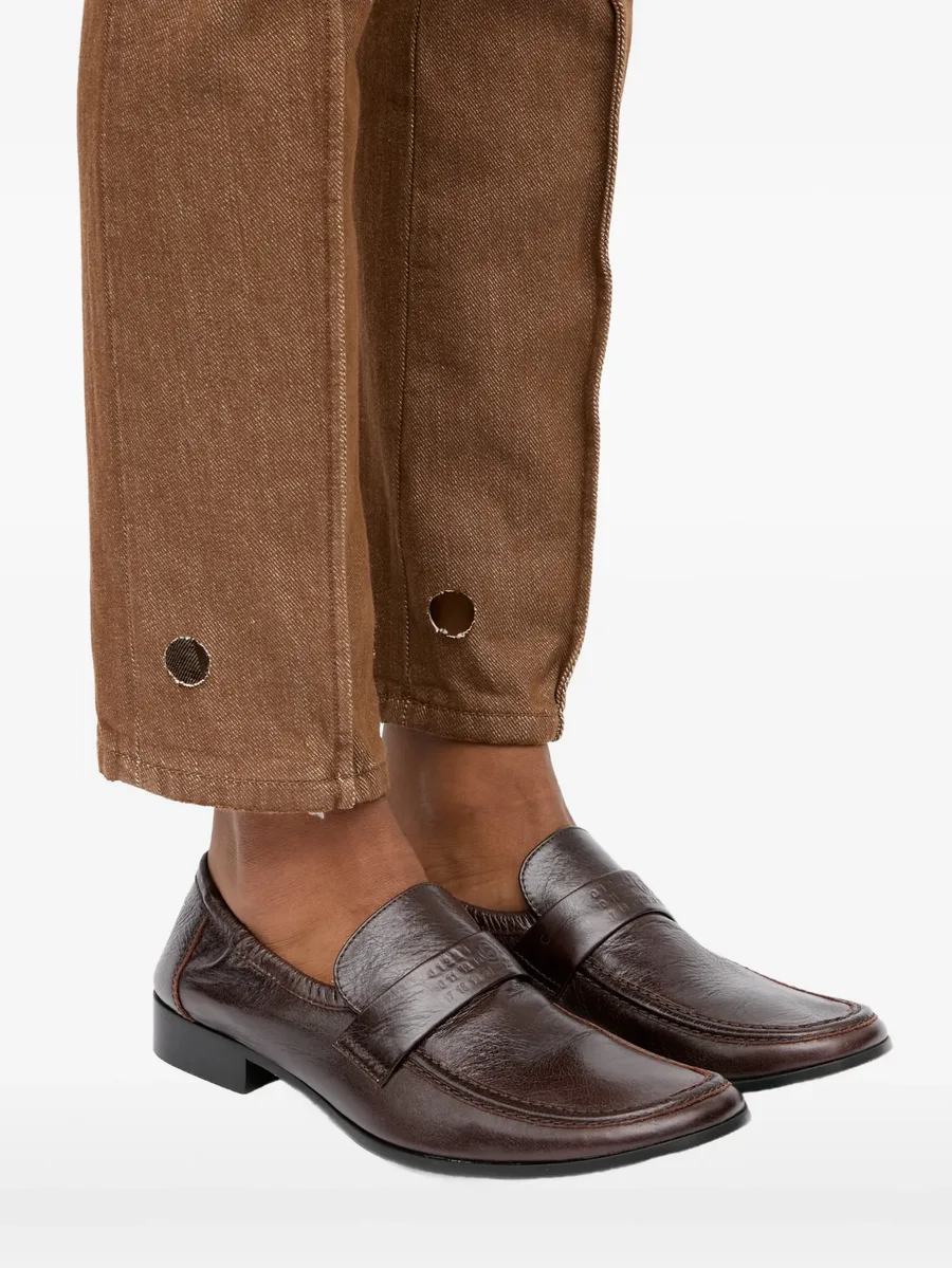 Swing-toe leather loafers 12