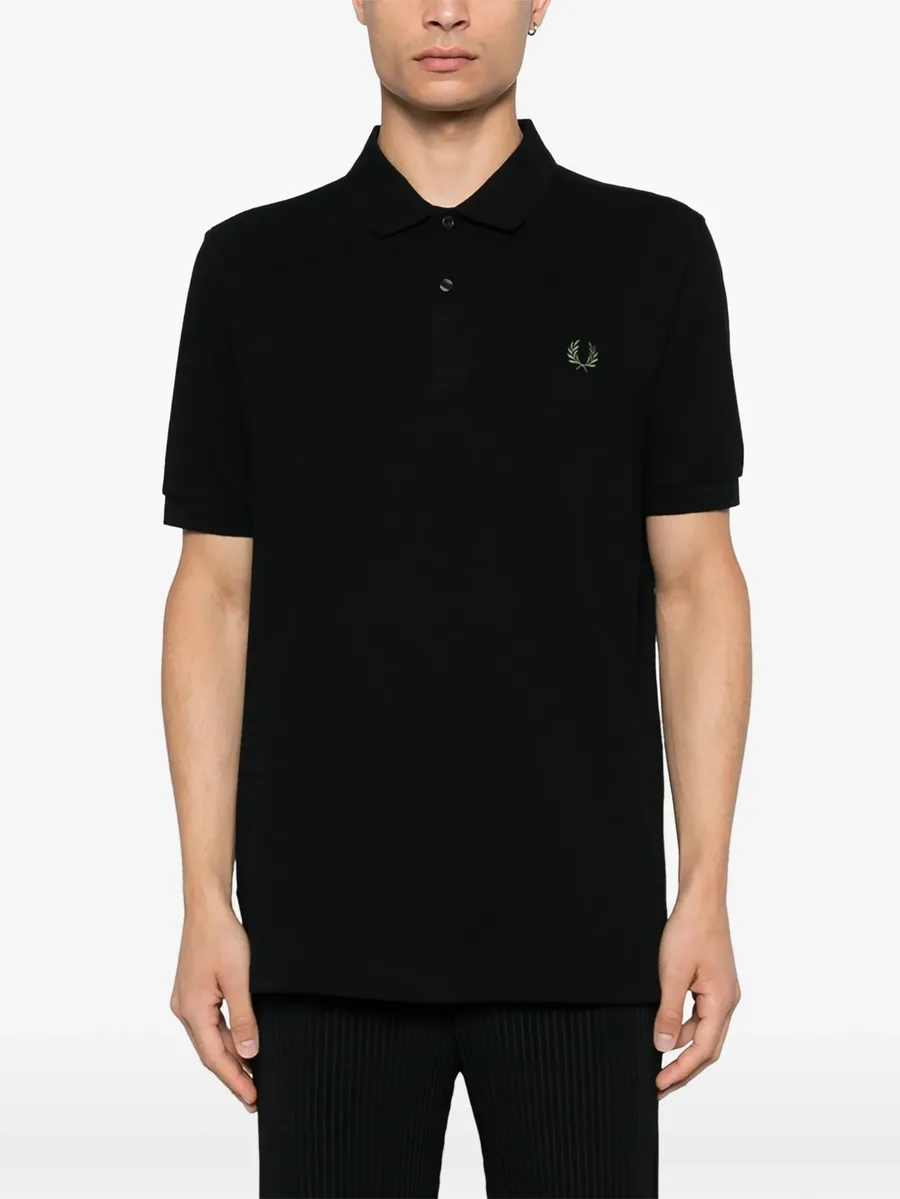 x Fred Perry slogan-print polo shirt 6