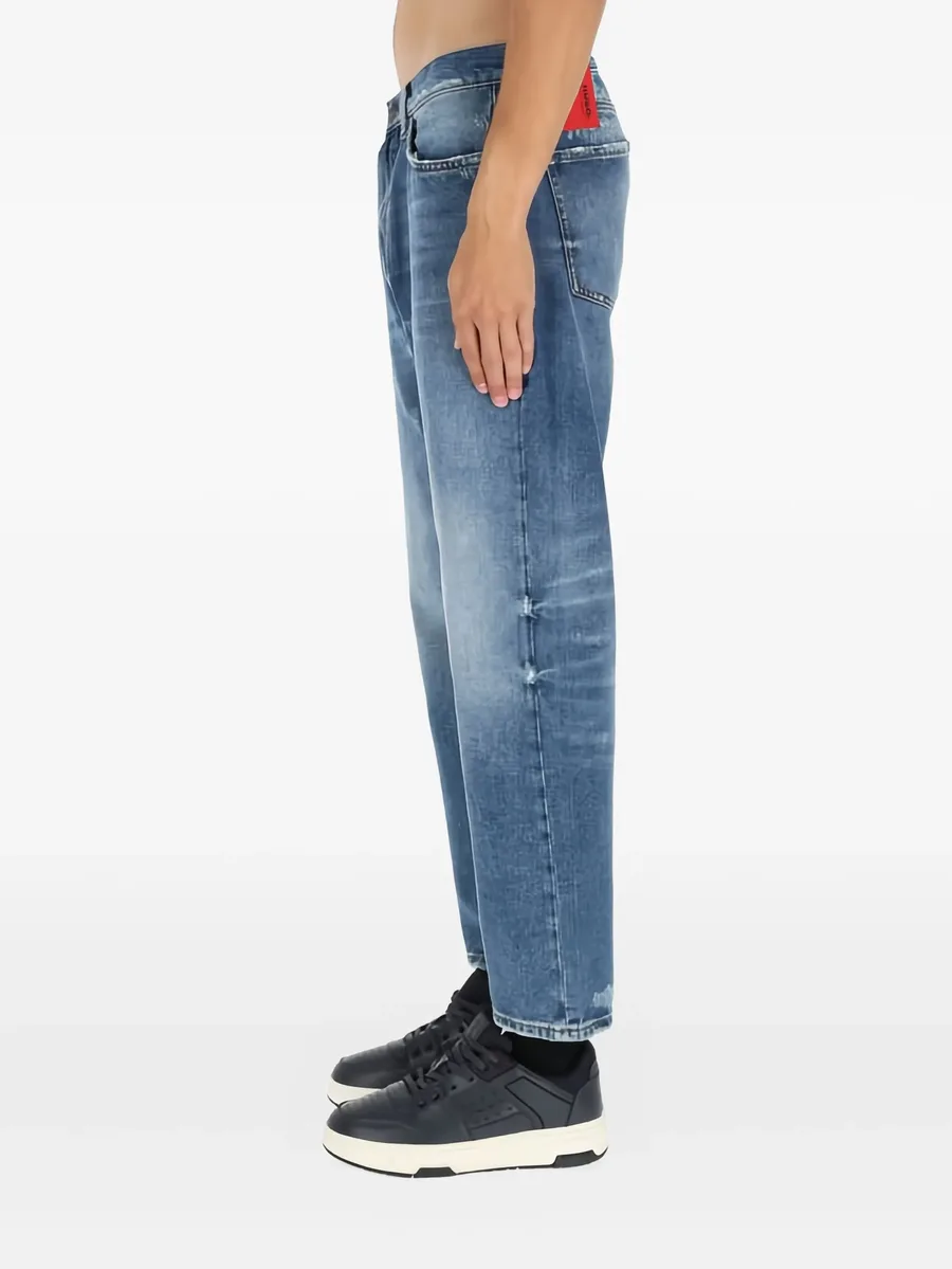 distressed-details logo-patch jeans 6