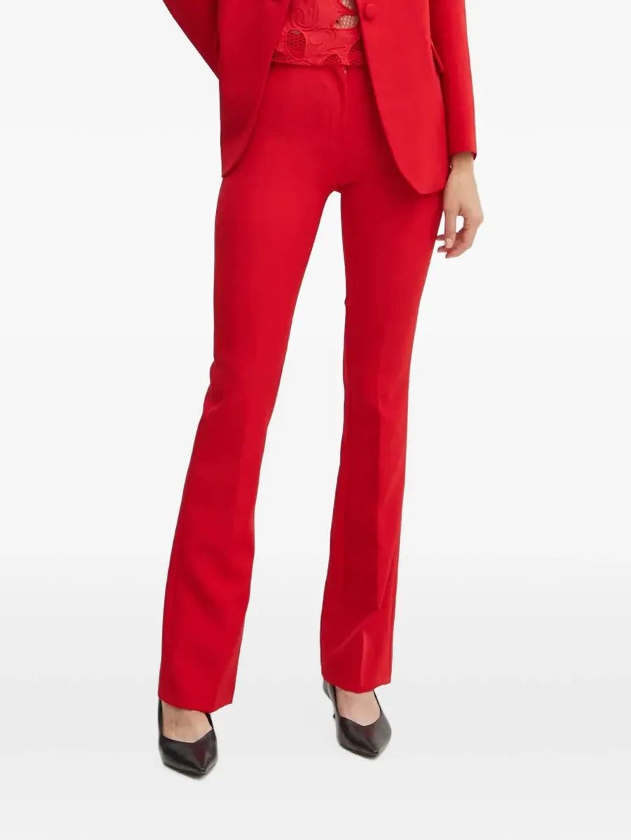 Reif pressed-crease flared trousers 1