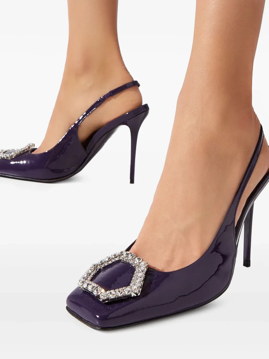 Decollete heeled pumps 8