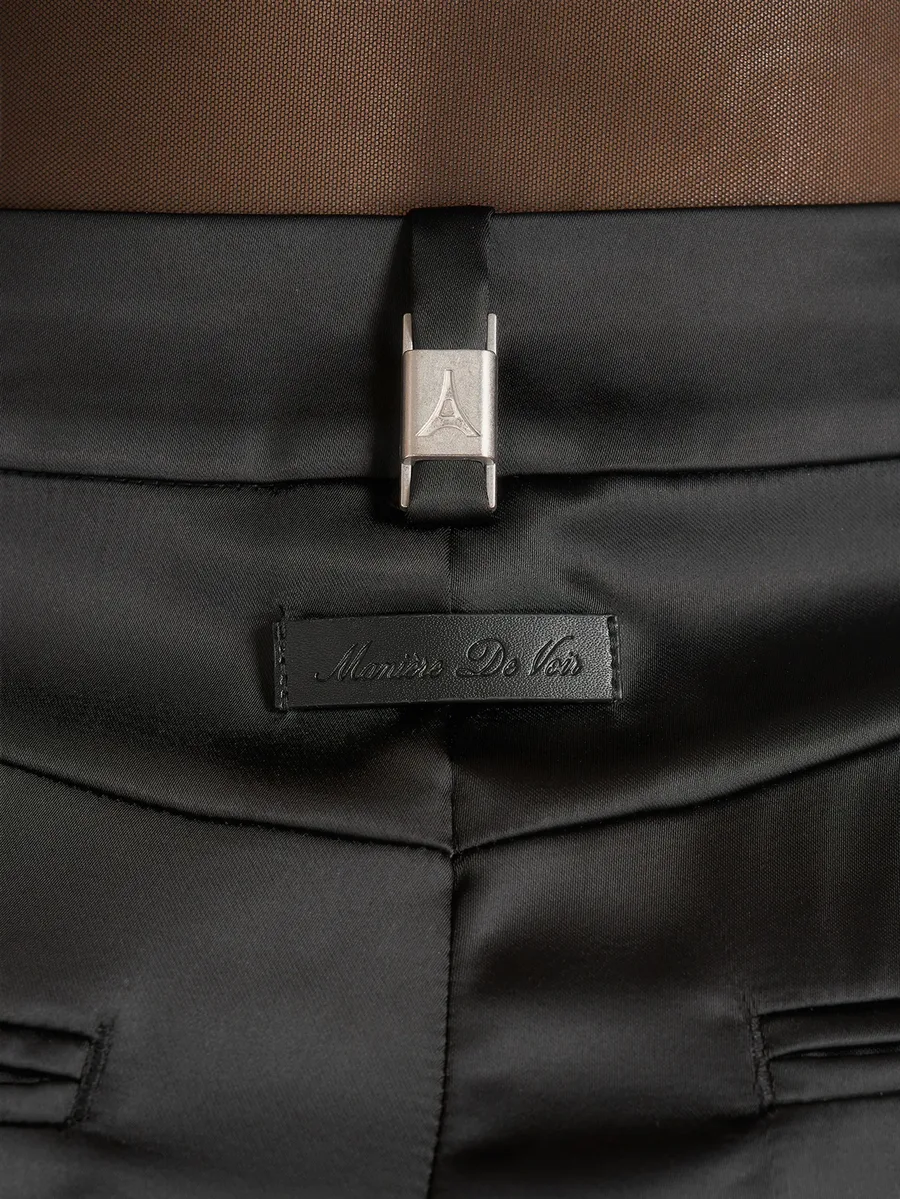 Julie in black satin twin-pleat trousers 6