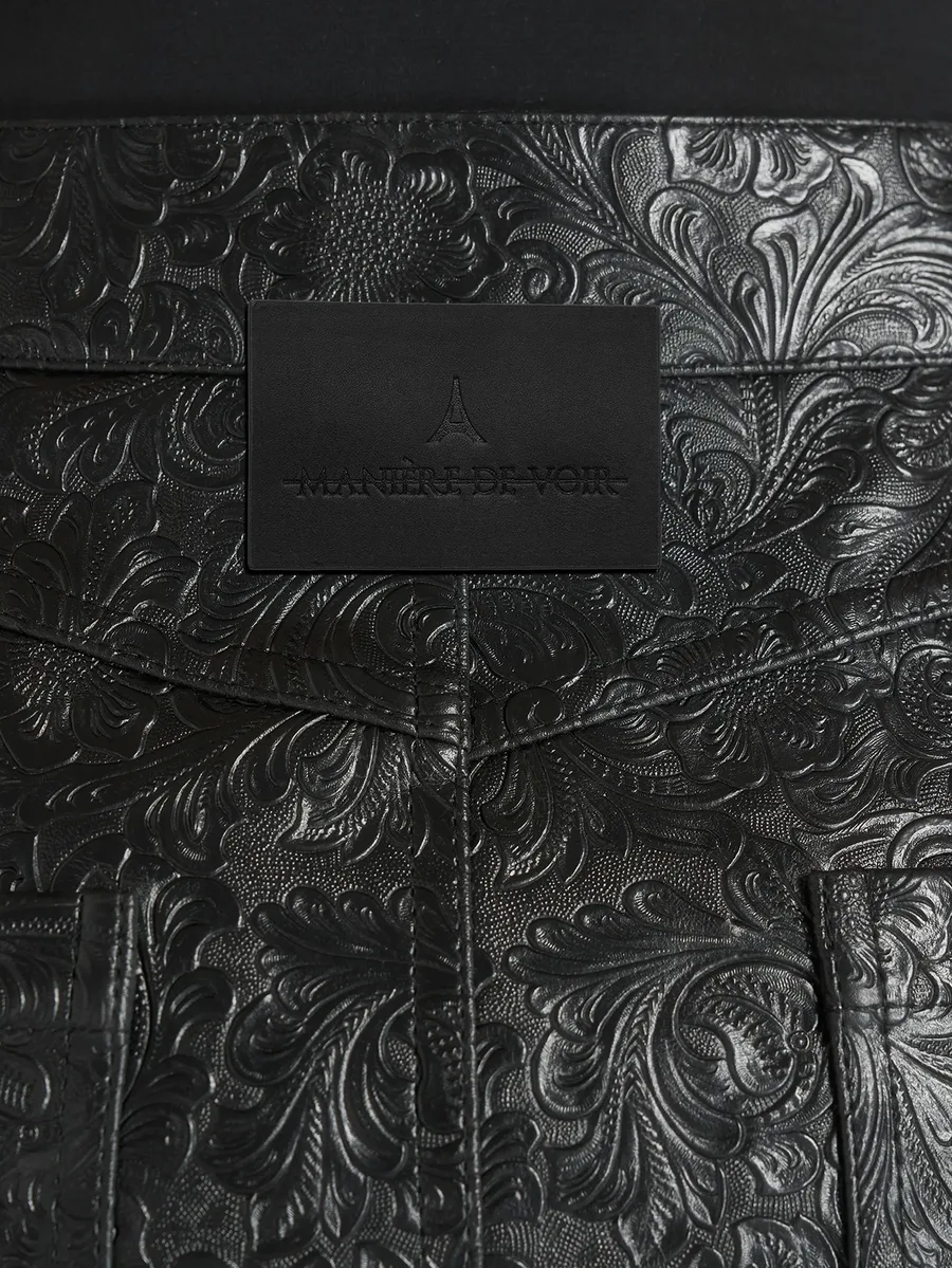 Ruth in black embossed-leather mid-rise trousers 5