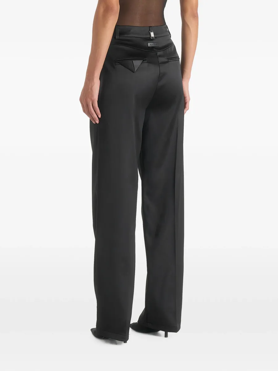 Julie in black satin twin-pleat trousers 3