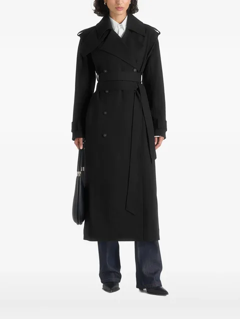 Esther in black tailored trench coat with double belt