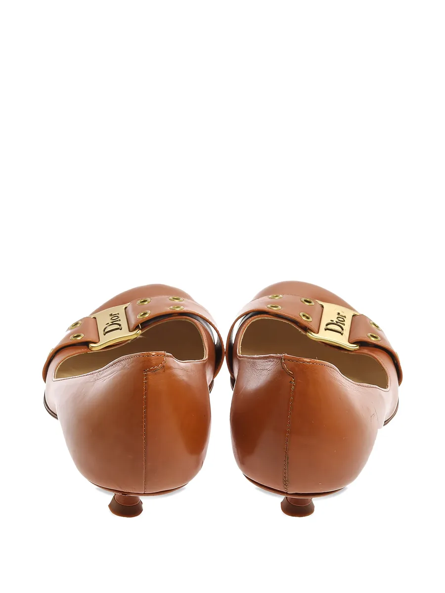 buckled grommet pumps 6