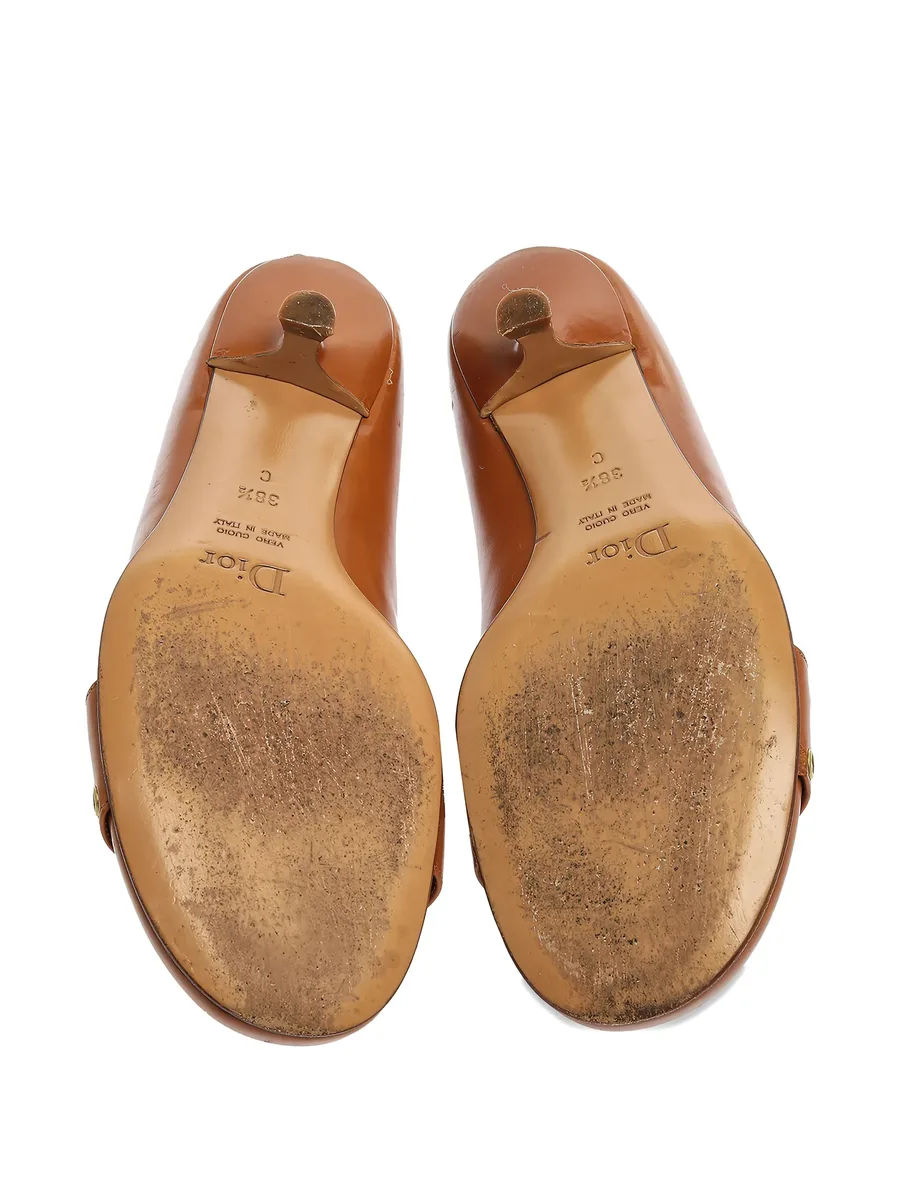 buckled grommet pumps 7