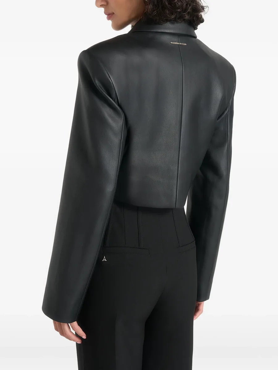 Adina in black leather cropped jacket 4