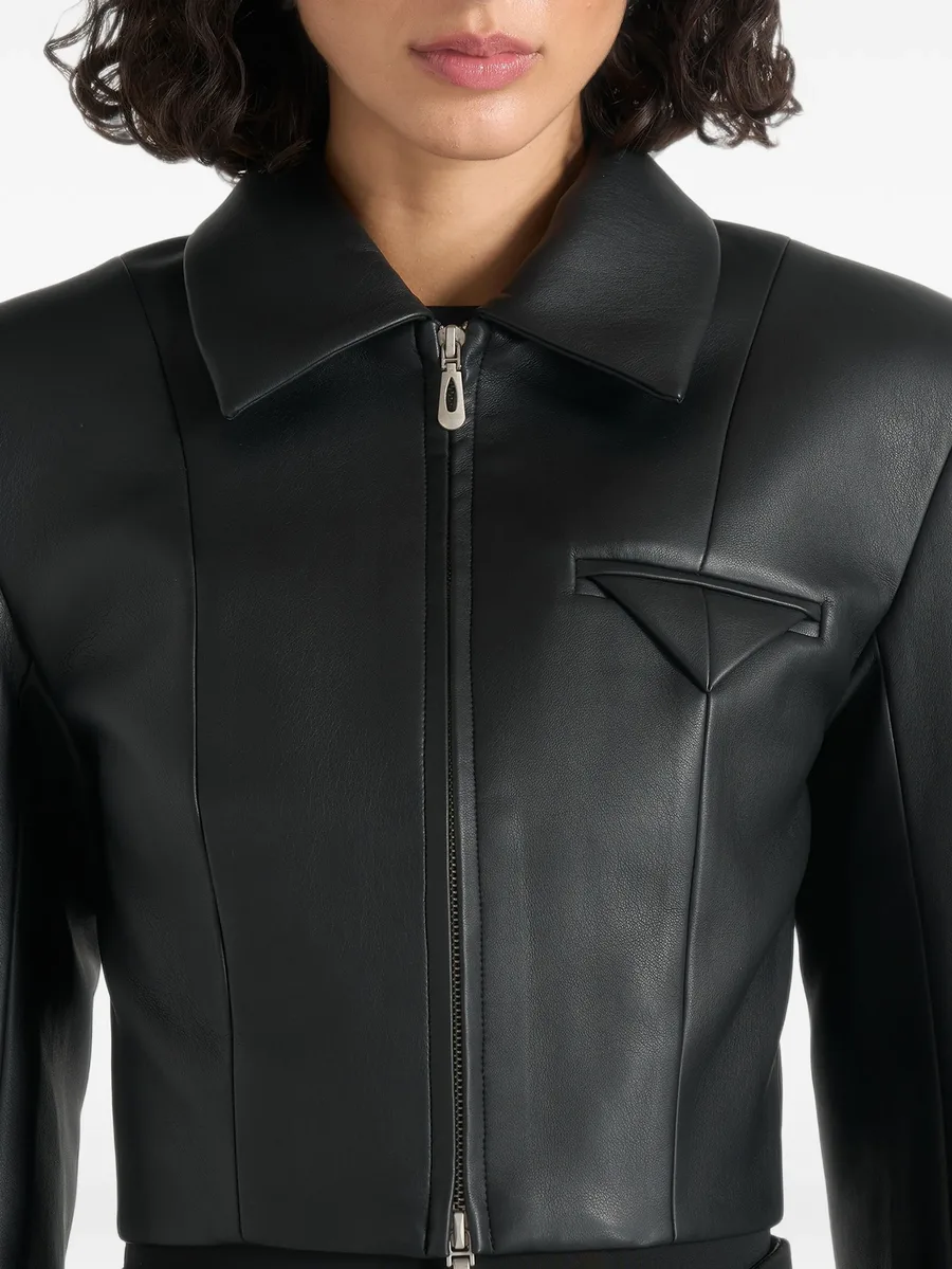 Adina in black leather cropped jacket 5