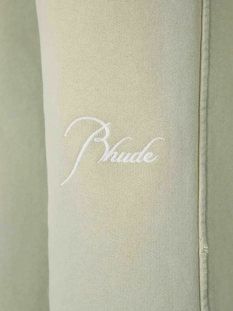 logo-embroidered worn-effect cotton track pants 4