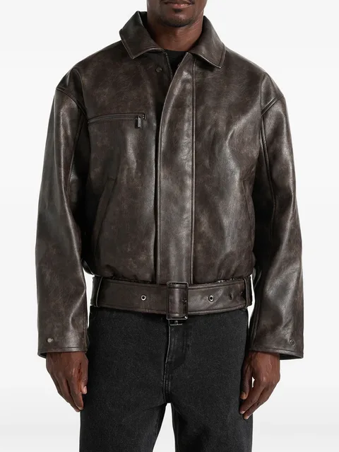 Ezra in brown leather belted bomber jacket