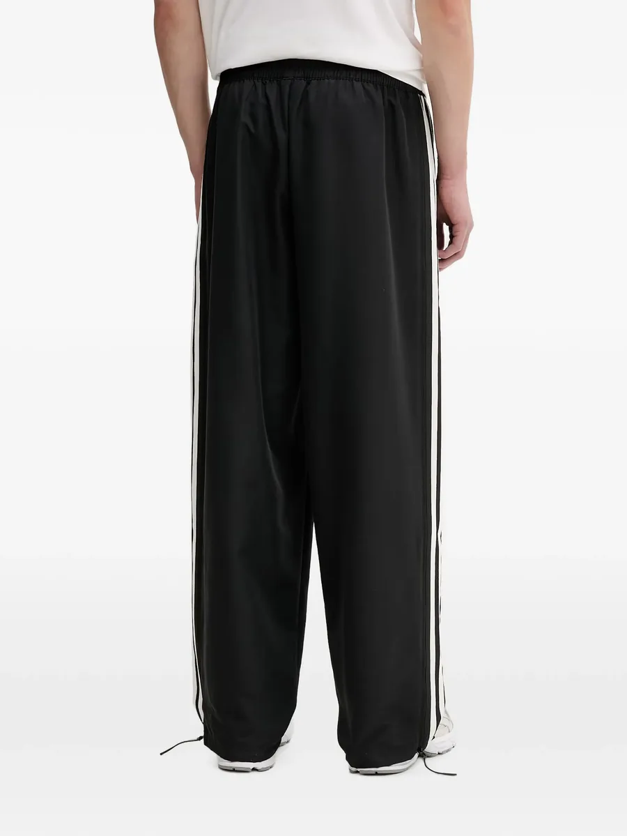 Windbreaker side-stripe track pants 4