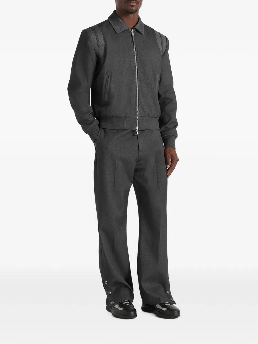 Boris in grey tailored button cuff trousers 2