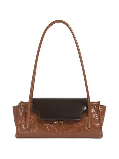 brown and black leather Trunkette bag