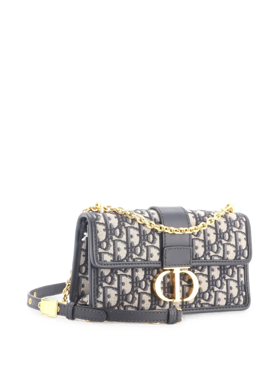 30 Montaigne Chain Flap Bag Oblique Canvas East West shoulder bag 1