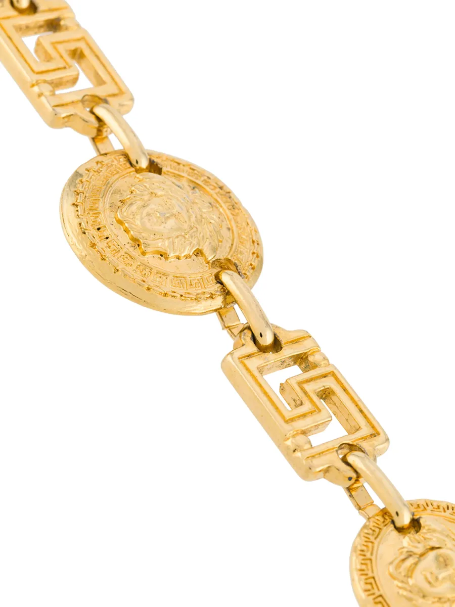 колье с подвеской-логотипом (1990-е годы) 6